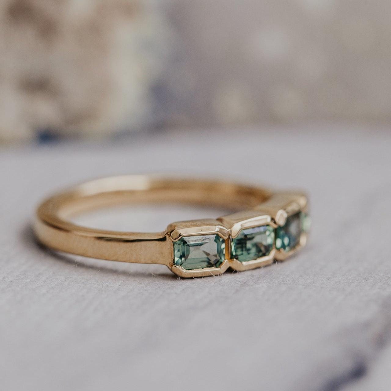 Four Stone Montana Sapphire Emerald Cut Silver Band | Anima jewels