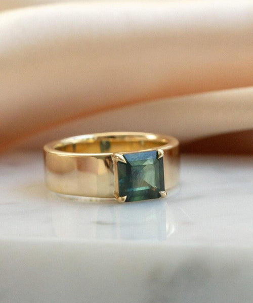 The Montana Heirloom: Emerald-Cut Teal Sapphire Ring in Bold Gold Band